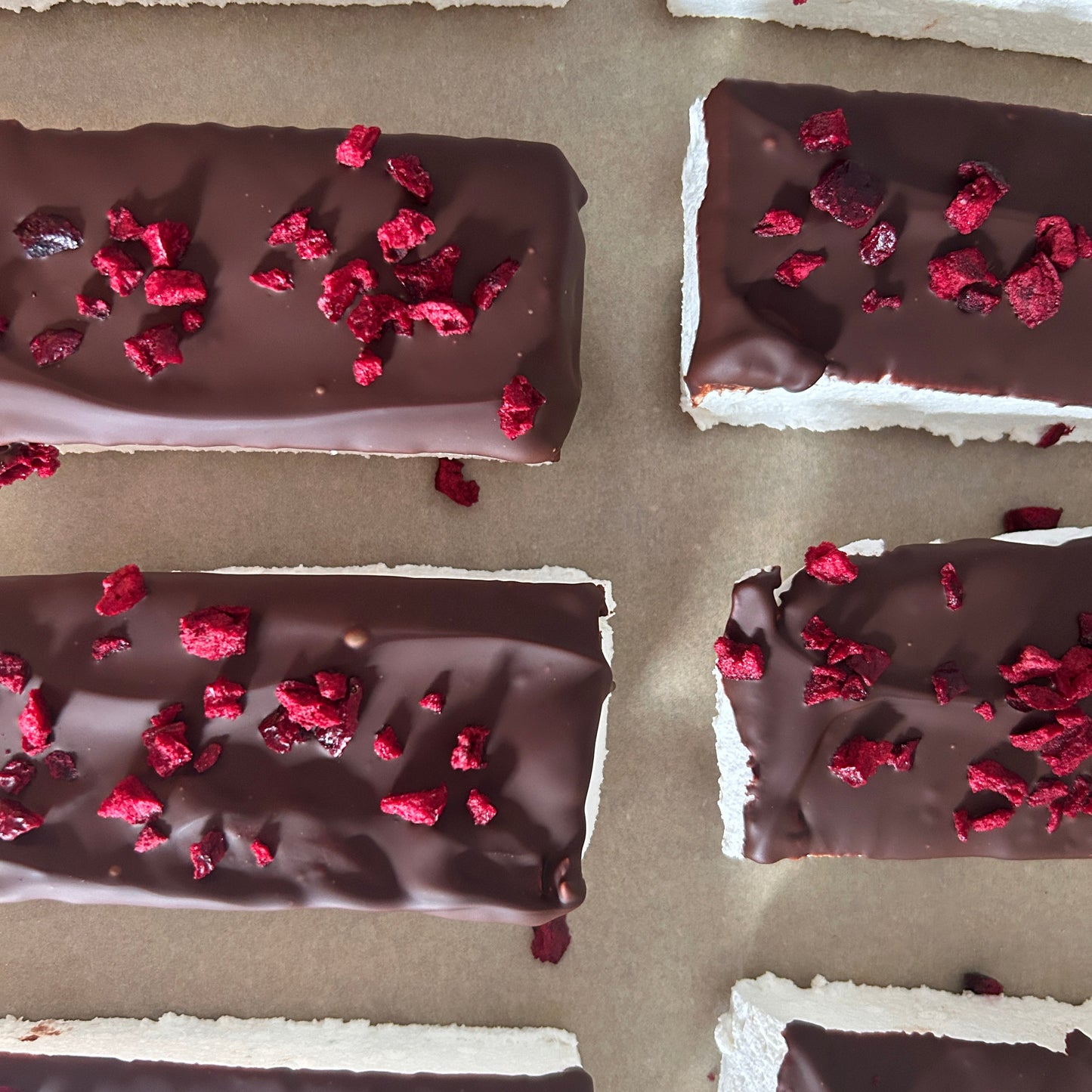 Cherry Dark Chocolate Protein Marshmallow Bar coated in rich dark chocolate, handmade in the UK by Trim Treats.