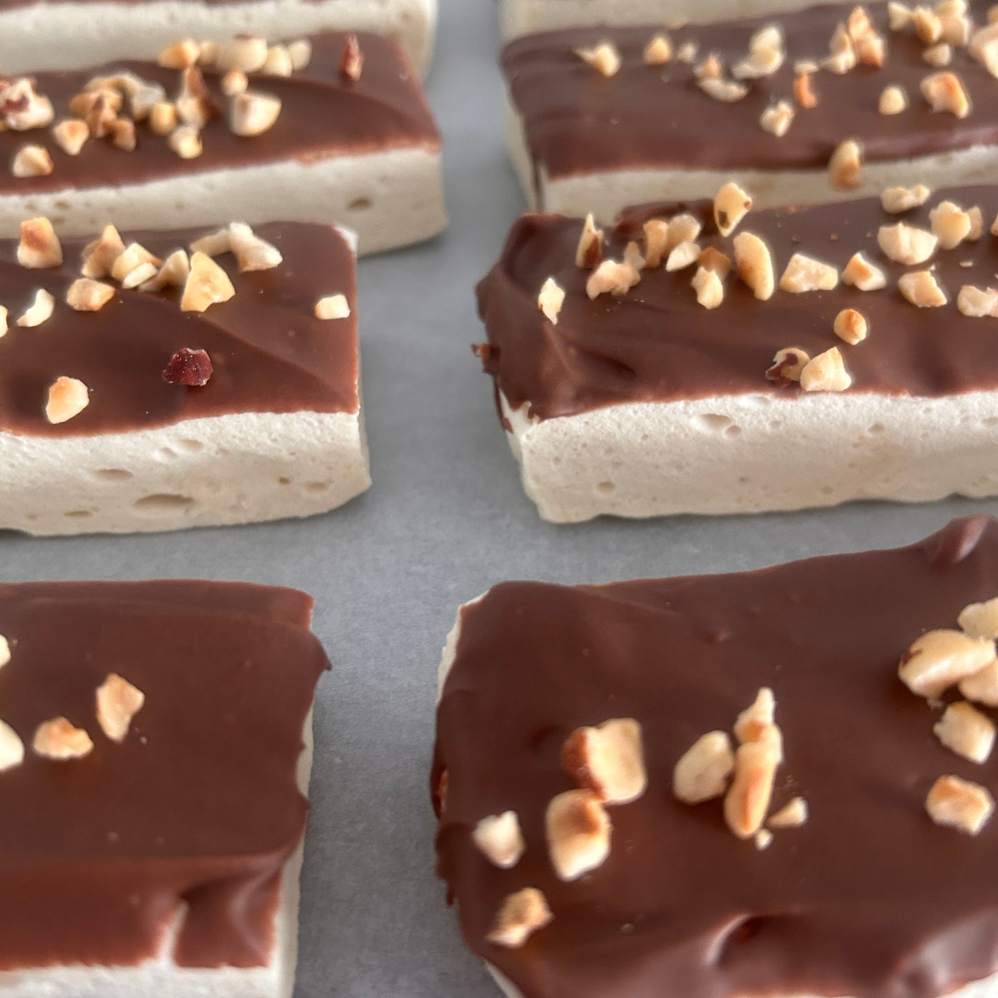 Hazelnut and white chocolate protein marshmallow bar handmade in the UK by Trim Treats.